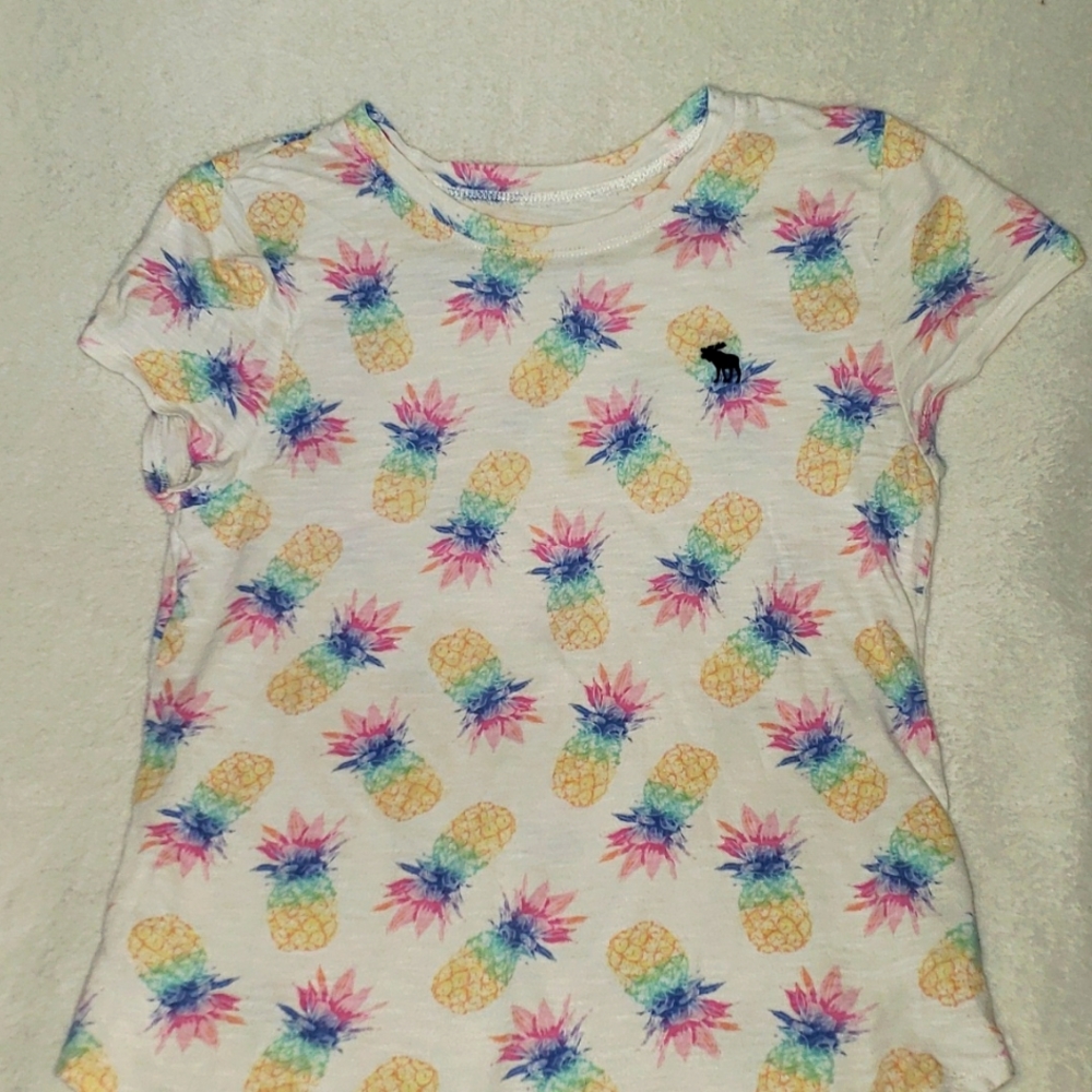 Child's Abercrombie shirt. White multicolored printed pineapples. Size 13/14